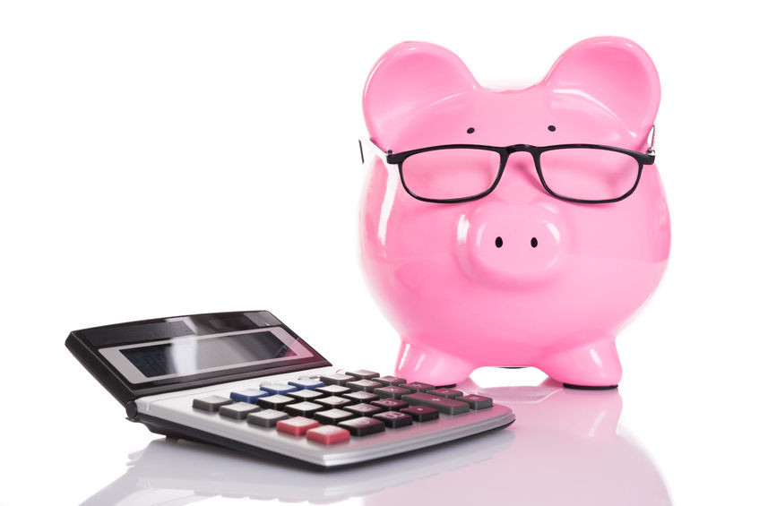 image of calculator and piggy bank